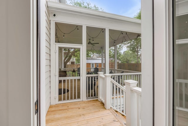 exterior space featuring ceiling fan