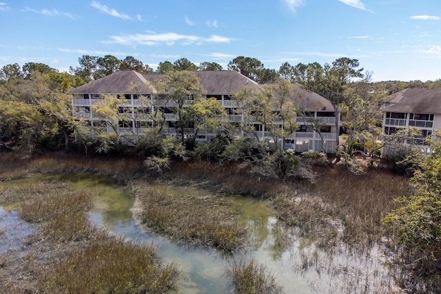 exterior space with a water view