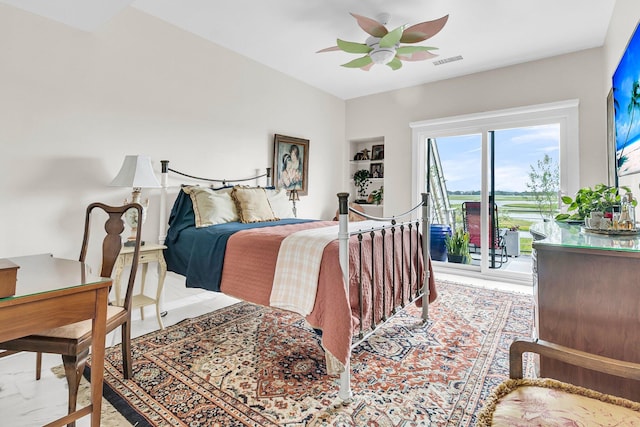 bedroom with ceiling fan and access to outside