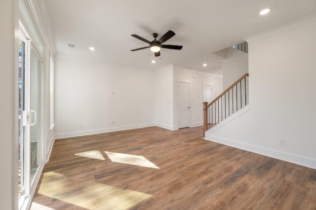 414 Katies Scenic Ct, Charleston, SC 29492 - unfurnished living room featuring stairway, a ceiling fan, wood finished floors, baseboards, and visible vents