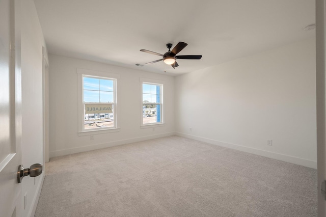414 Katies Scenic Ct, Charleston, SC 29492 - unfurnished room with light colored carpet, baseboards, a ceiling fan, and visible vents