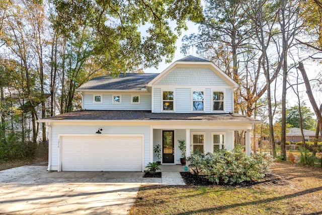 farmhouse inspired home featuring a garage