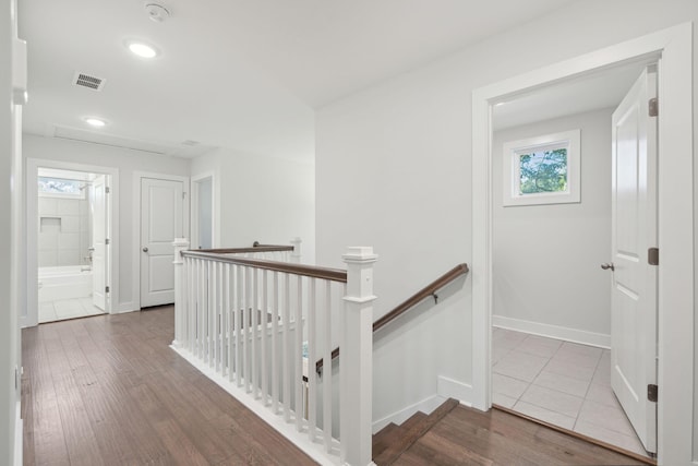 corridor featuring hardwood / wood-style flooring