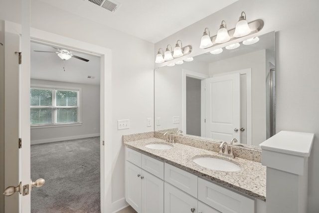 bathroom featuring vanity and ceiling fan