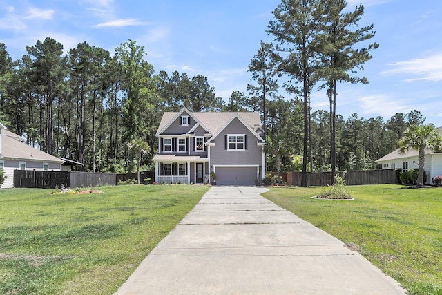 404 Bowstring Dr, Huger, SC 29450 - view of front of house featuring concrete driveway, an attached garage, and a porch