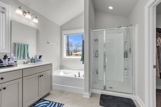 404 Bowstring Dr, Huger, SC 29450 - full bath featuring a stall shower, vanity, a bath, tile patterned floors, and vaulted ceiling