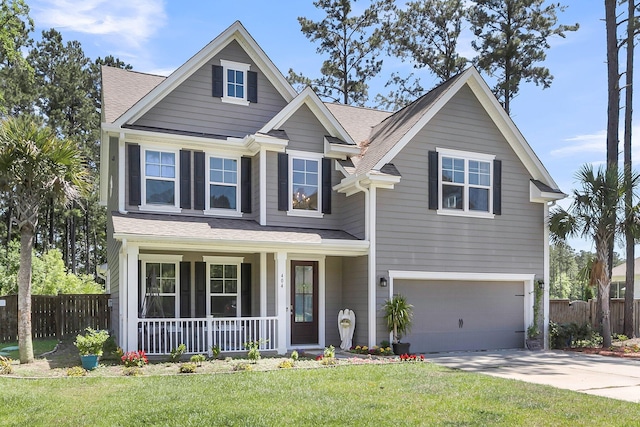 404 Bowstring Dr, Huger, SC 29450 - view of front of property featuring a porch, an attached garage, concrete driveway, and a shingled roof