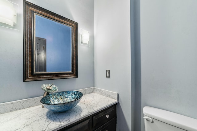 1560 NW Lee Blvd, Orangeburg, SC 29118 - half bathroom featuring vanity and toilet