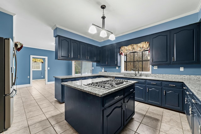 1560 NW Lee Blvd, Orangeburg, SC 29118 - kitchen featuring pendant lighting, ornamental molding, light tile patterned floors, a peninsula, and stainless steel appliances