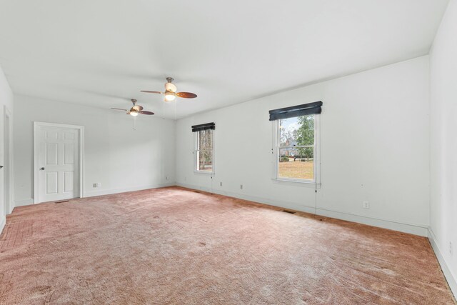 1560 NW Lee Blvd, Orangeburg, SC 29118 - carpeted empty room featuring baseboards and ceiling fan
