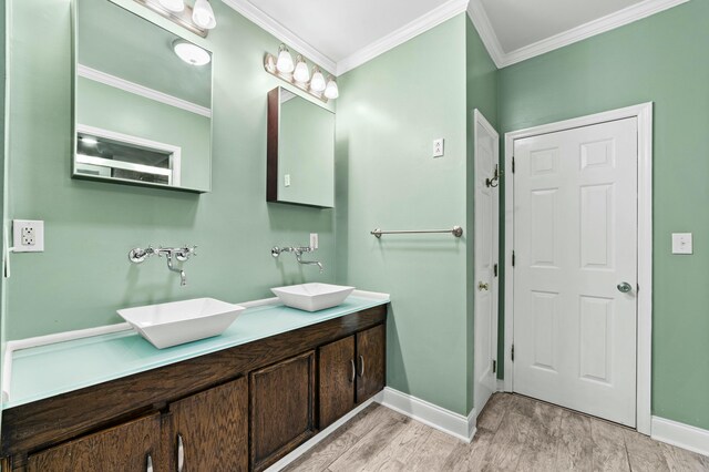 1560 NW Lee Blvd, Orangeburg, SC 29118 - full bathroom featuring a sink, baseboards, wood finished floors, and crown molding
