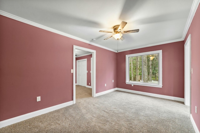 1560 NW Lee Blvd, Orangeburg, SC 29118 - unfurnished room featuring ceiling fan, carpet, baseboards, and ornamental molding