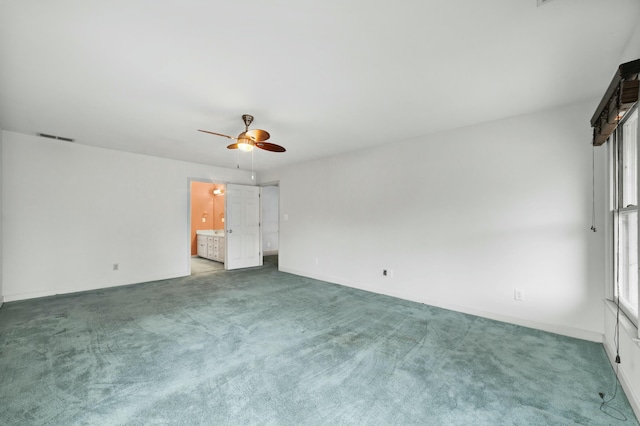 1560 NW Lee Blvd, Orangeburg, SC 29118 - unfurnished bedroom featuring multiple windows, carpet flooring, a ceiling fan, and visible vents