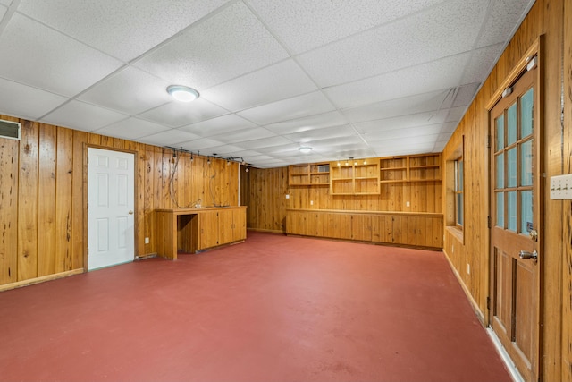 1560 NW Lee Blvd, Orangeburg, SC 29118 - finished basement with wooden walls, visible vents, and a drop ceiling