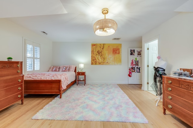 bedroom featuring light hardwood / wood-style floors