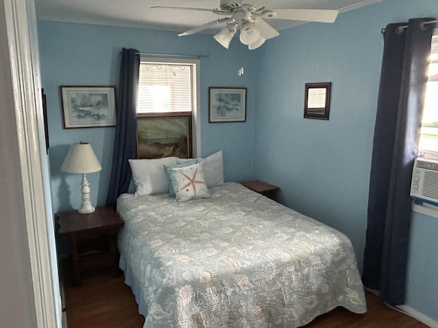 1736 E Ashley Ave, Folly Beach, SC 29439 - bedroom with dark wood finished floors and a ceiling fan