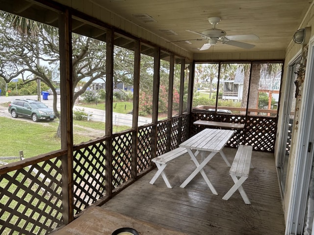 1736 E Ashley Ave, Folly Beach, SC 29439 - unfurnished sunroom with a ceiling fan