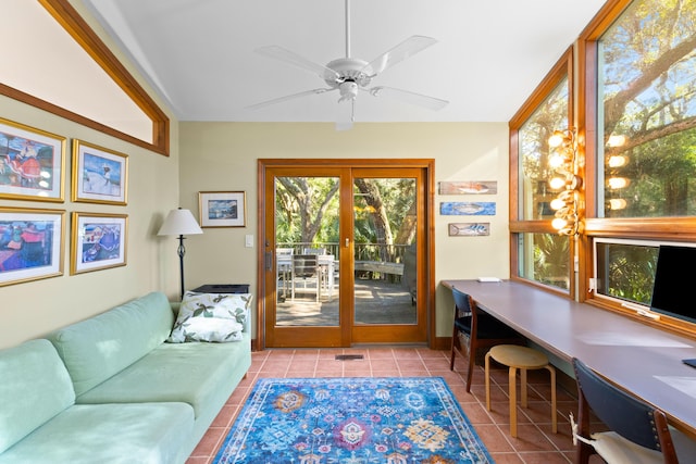 interior space with ceiling fan, french doors, and light tile patterned floors