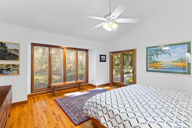 bedroom featuring access to outside, ceiling fan, light hardwood / wood-style flooring, and vaulted ceiling