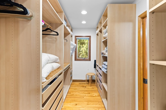 walk in closet featuring light wood-type flooring