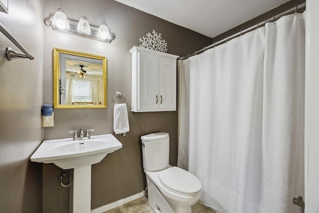 647 Ellis St, Mount Pleasant, SC 29464 - bathroom with toilet, ceiling fan, and a shower with shower curtain