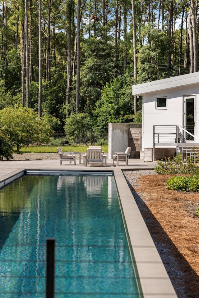 view of pool with a patio area