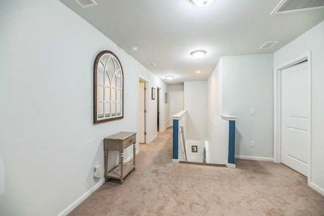 9711 Fanning Basket Ln, Ladson, SC 29456 - hallway featuring an upstairs landing, light colored carpet, and baseboards