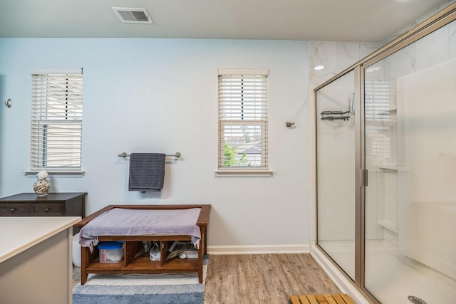 9711 Fanning Basket Ln, Ladson, SC 29456 - full bathroom featuring wood finished floors, a shower stall, and baseboards