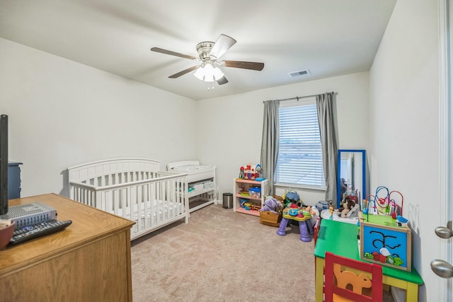 9711 Fanning Basket Ln, Ladson, SC 29456 - carpeted bedroom featuring a crib, a ceiling fan, and a desk