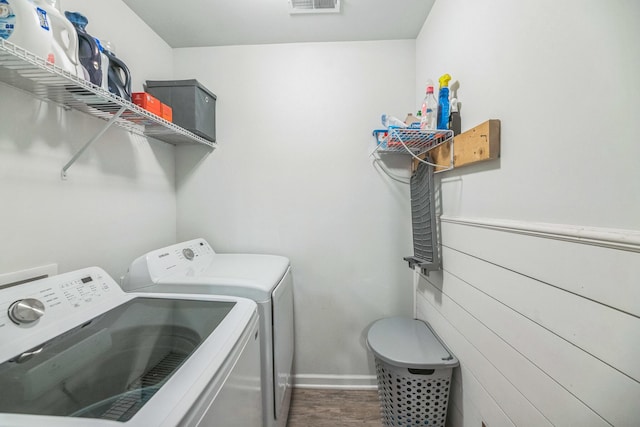 9711 Fanning Basket Ln, Ladson, SC 29456 - laundry area featuring washing machine and dryer, baseboards, and dark wood-style floors