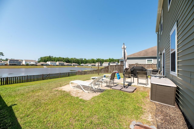 9711 Fanning Basket Ln, Ladson, SC 29456 - view of yard featuring a patio and a water view
