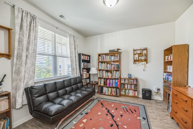 9711 Fanning Basket Ln, Ladson, SC 29456 - living area featuring wood finished floors and baseboards