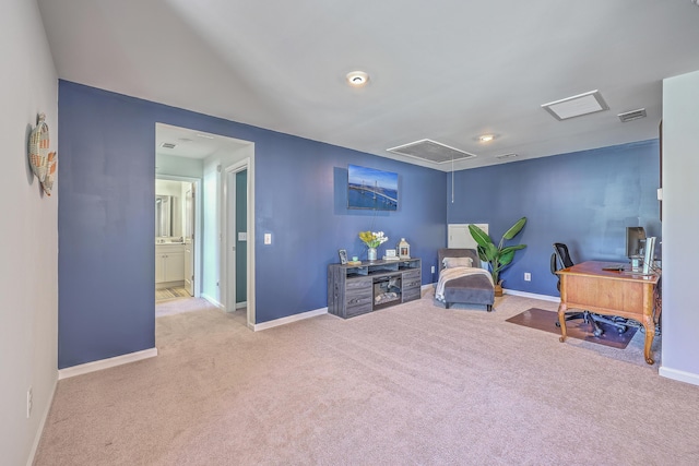 carpeted office space featuring attic access, visible vents, and baseboards