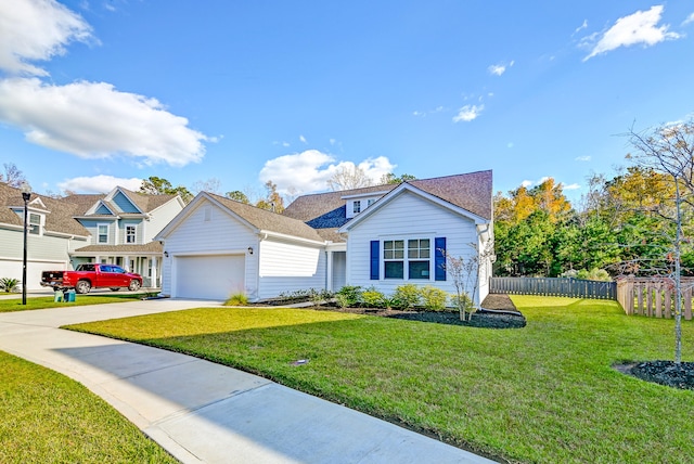 view of front of home featuring a front lawn and a garage