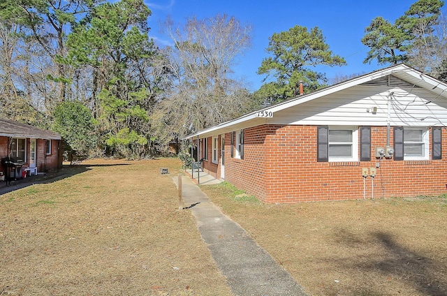 1530 Orange Grove Rd Unit A & B, Charleston, SC 29407 - view of side of home with brick siding and a yard