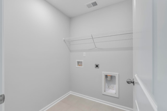 laundry room with hookup for a washing machine and hookup for an electric dryer