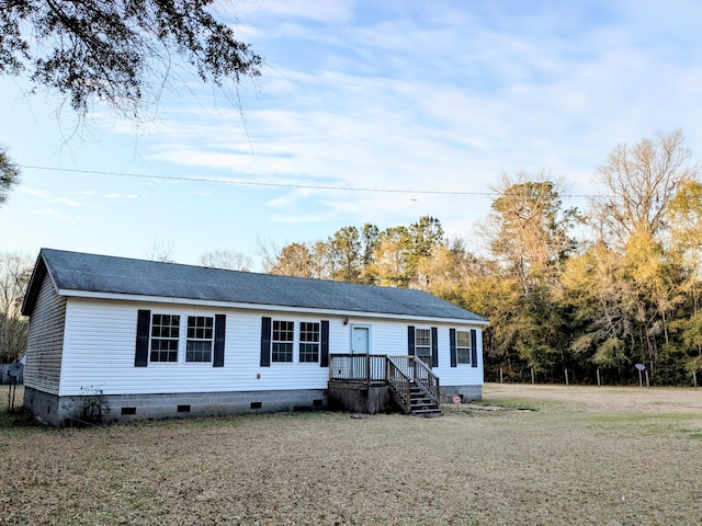 view of front of property with crawl space and a shingled roof