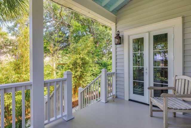 balcony featuring french doors