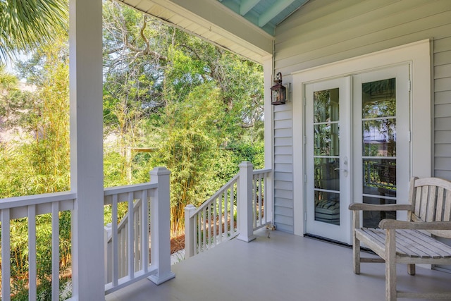 balcony featuring french doors