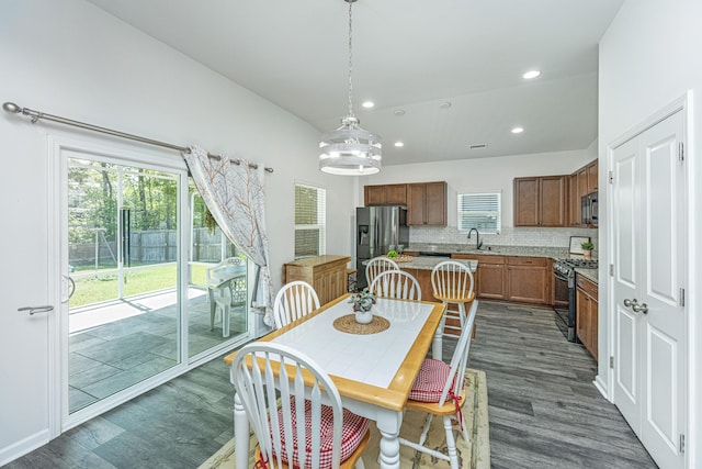 dining room featuring recessed lighting and dark wood-style floors