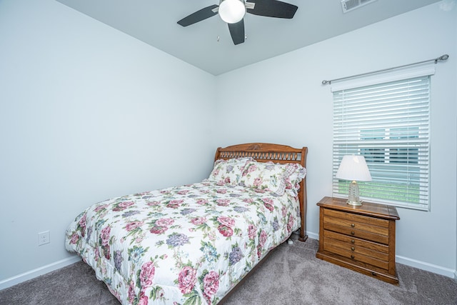 bedroom featuring baseboards, carpet flooring, and ceiling fan