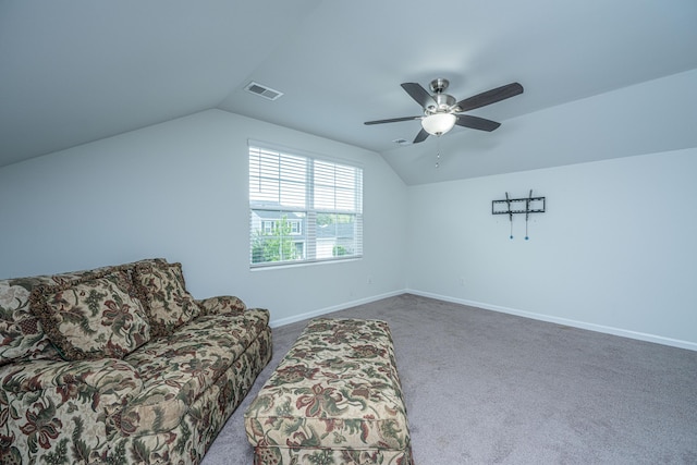 living area with baseboards, visible vents, carpet, and lofted ceiling