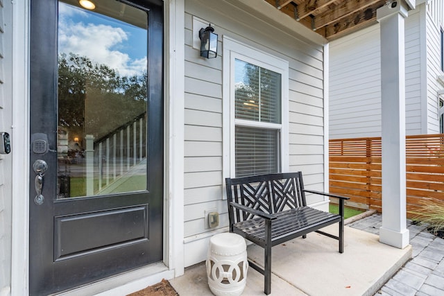 entrance to property featuring a porch