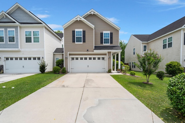 view of front facade with concrete driveway, a front lawn, and a garage