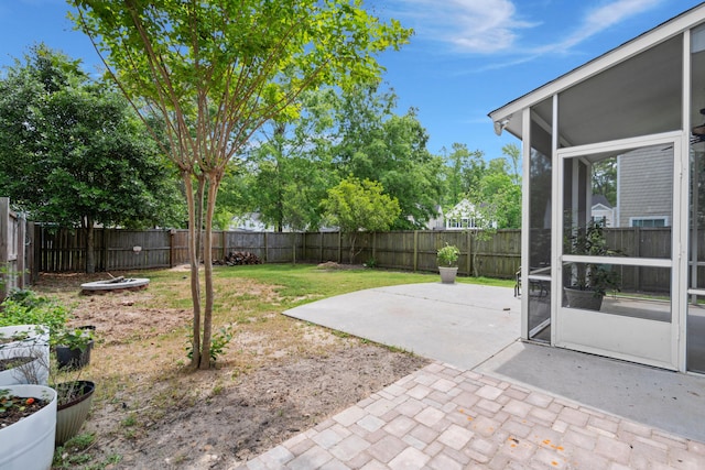 view of yard with a fenced backyard and a patio area