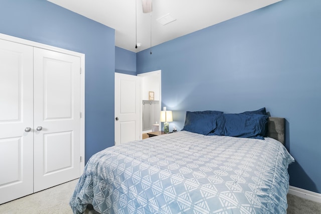 bedroom featuring carpet, a closet, and ceiling fan