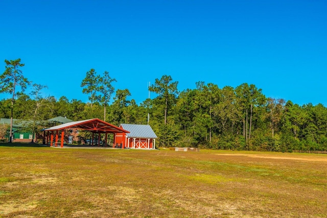 view of yard featuring an outbuilding and a gazebo