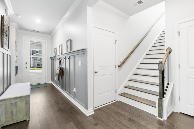 interior space featuring dark hardwood / wood-style flooring and ornamental molding