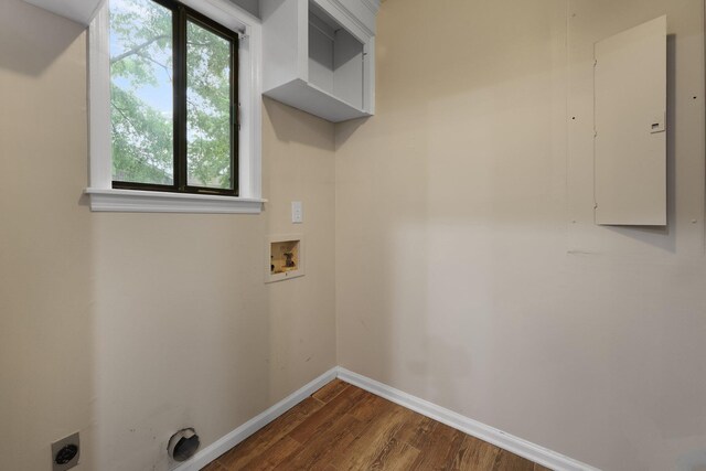 105 Londonderry Rd, Goose Creek, SC 29445 - laundry room with hookup for an electric dryer, hookup for a washing machine, dark wood-style flooring, and baseboards