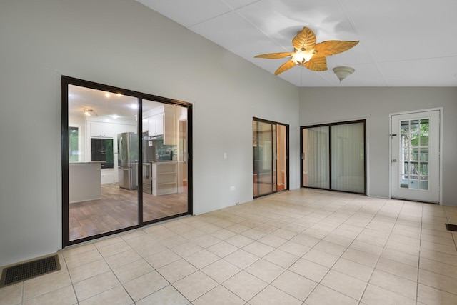 105 Londonderry Rd, Goose Creek, SC 29445 - unfurnished room with vaulted ceiling, a ceiling fan, and light tile patterned flooring